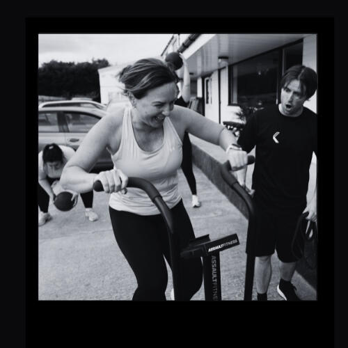 Damien holding weights Damien celebrating weight loss at teknique